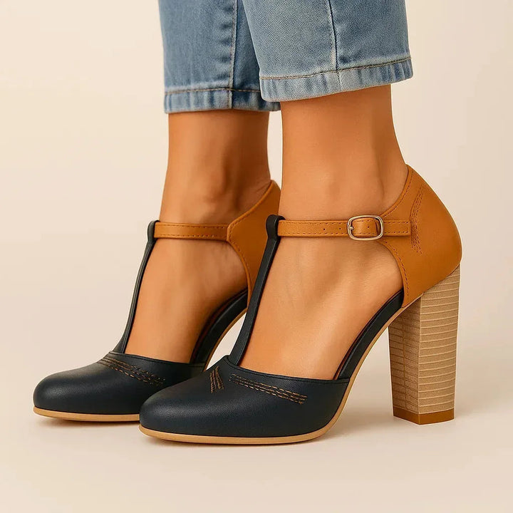 Sophisticated women's block heel pumps with two-tone design, blending comfort and elegant fashion.
