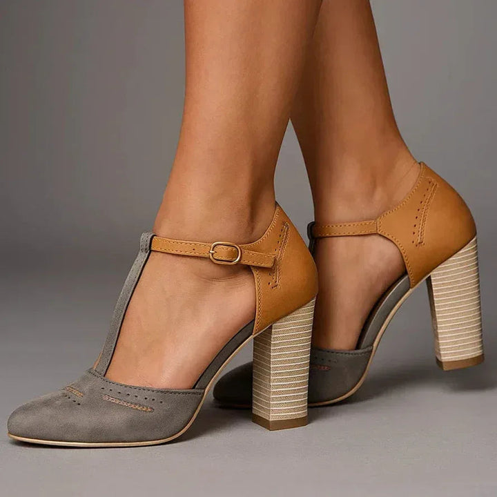 Everyday elegant women's two-tone block heel pumps, perfect as comfortable dress shoes.