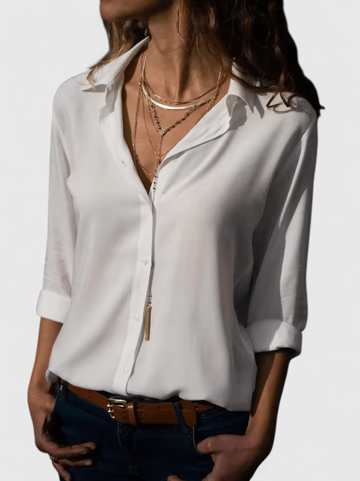 Professional women's V-neck blouse. Elegant long sleeve top for workwear, office chic, or smart casual outfits.