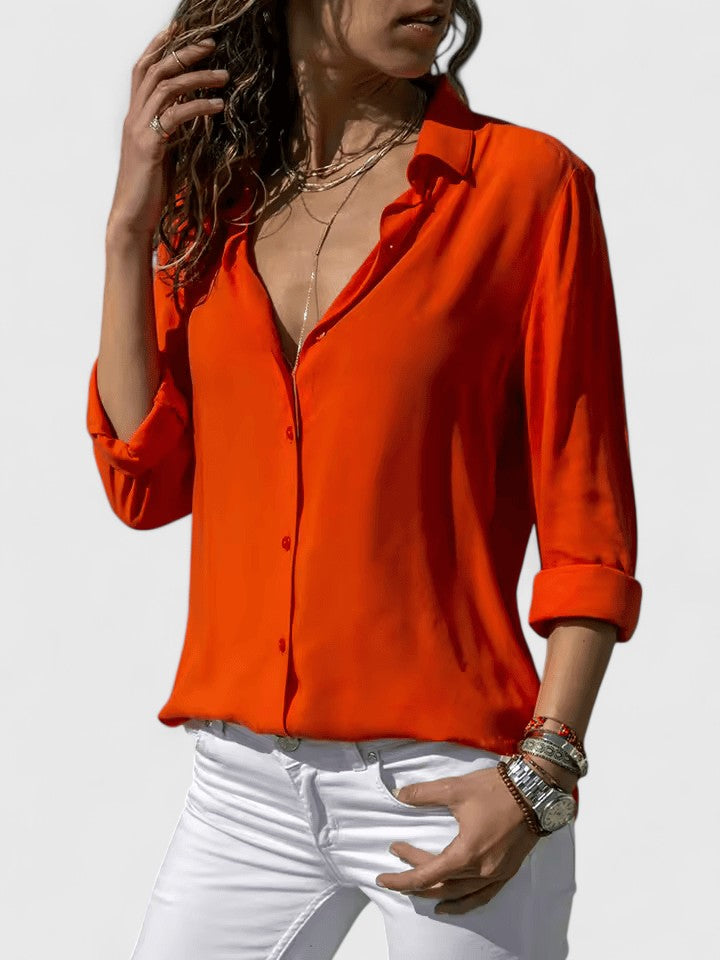 Soft, flowy V-neck blouse for women. Elegant long sleeve top, versatile for spring fashion & summer style.