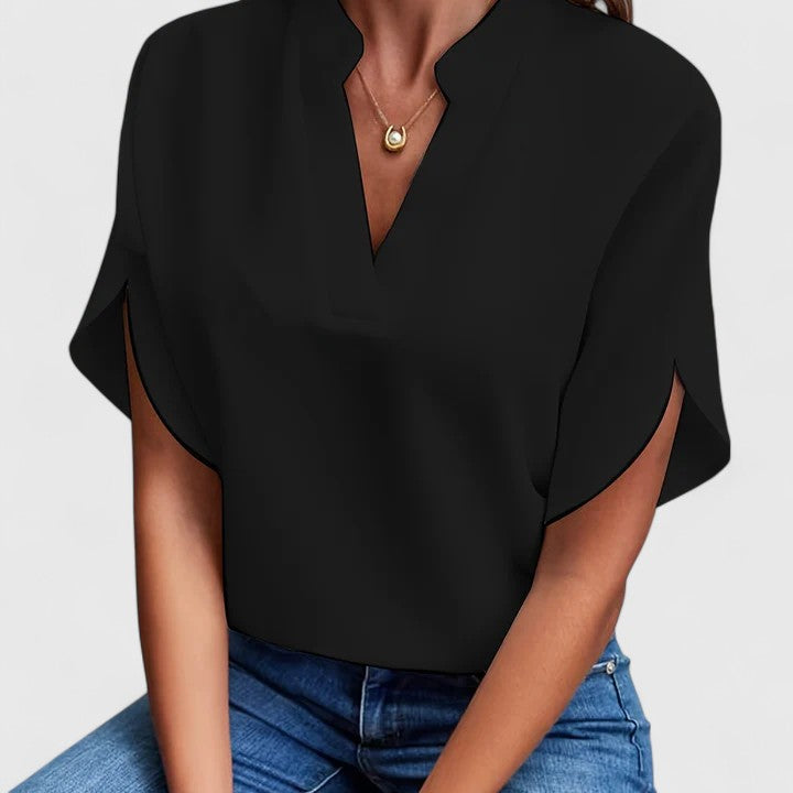 Stylish long sleeve v-neck blouse for women. A versatile top for casual or elegant summer outfits.