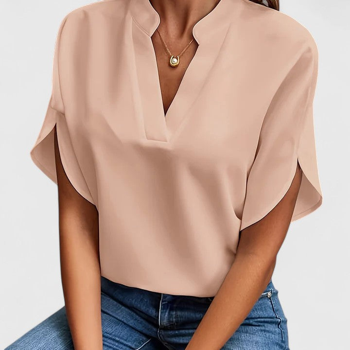 Fashionable women's long sleeve v-neck blouse, a chic & elegant top for any occasion.