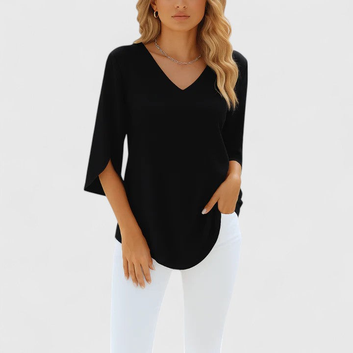 Stylish casual women's v-neck blouse with split sleeves. A comfortable and elegant summer top for versatile wear.