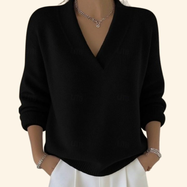 Fashionable women's V-neck top, an elegant long sleeve blouse designed for versatile office and casual wear.