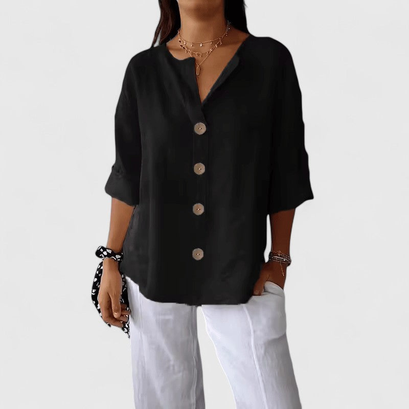 Elegant women's V-neck button-down blouse with long sleeves, perfect for office or casual summer wear.
