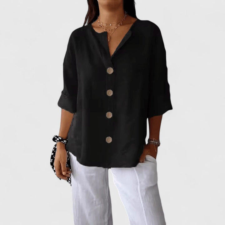 Elegant women's V-neck button-down blouse with long sleeves, perfect for office or casual summer wear.