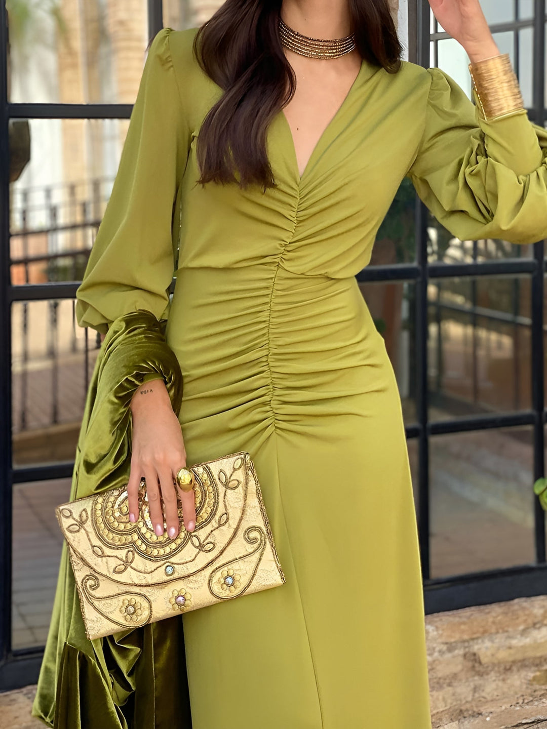Sophisticated evening gown: women's V-neck long sleeve ruched high-low maxi dress.