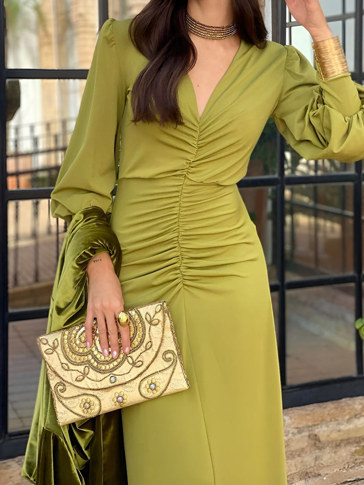 Sophisticated evening gown: women's V-neck long sleeve ruched high-low maxi dress.