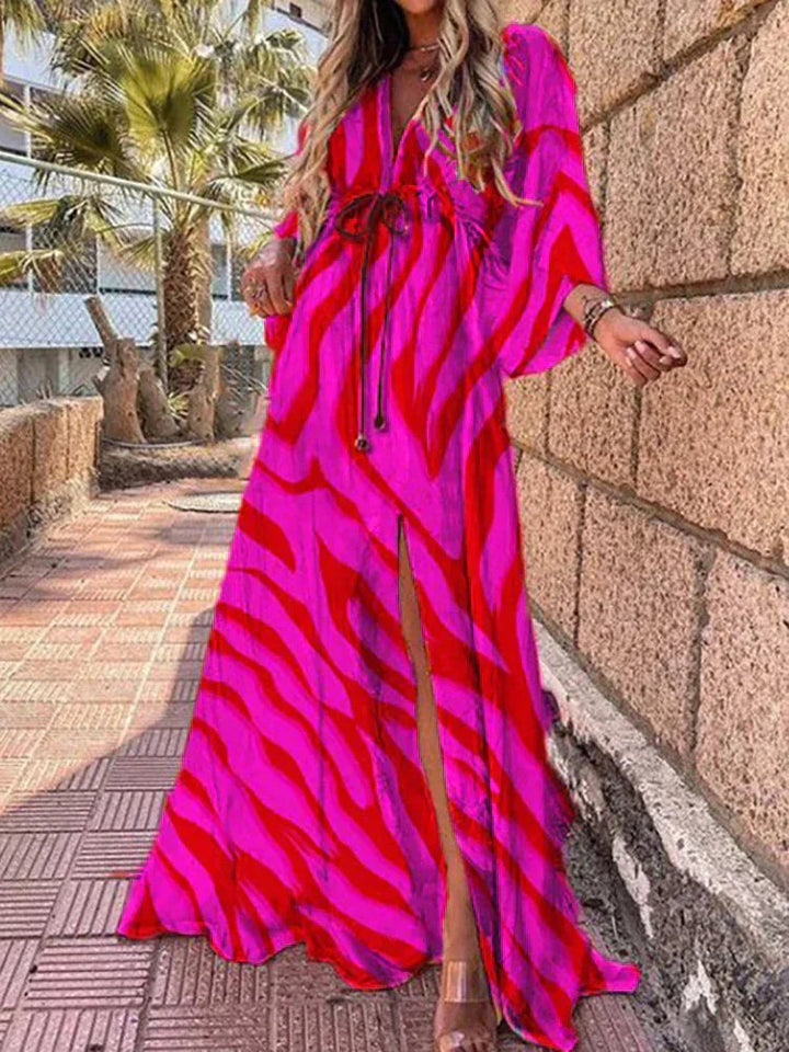 Flowy women's V-neck maxi dress with comfortable kimono sleeves & a flattering high slit for summer elegance.