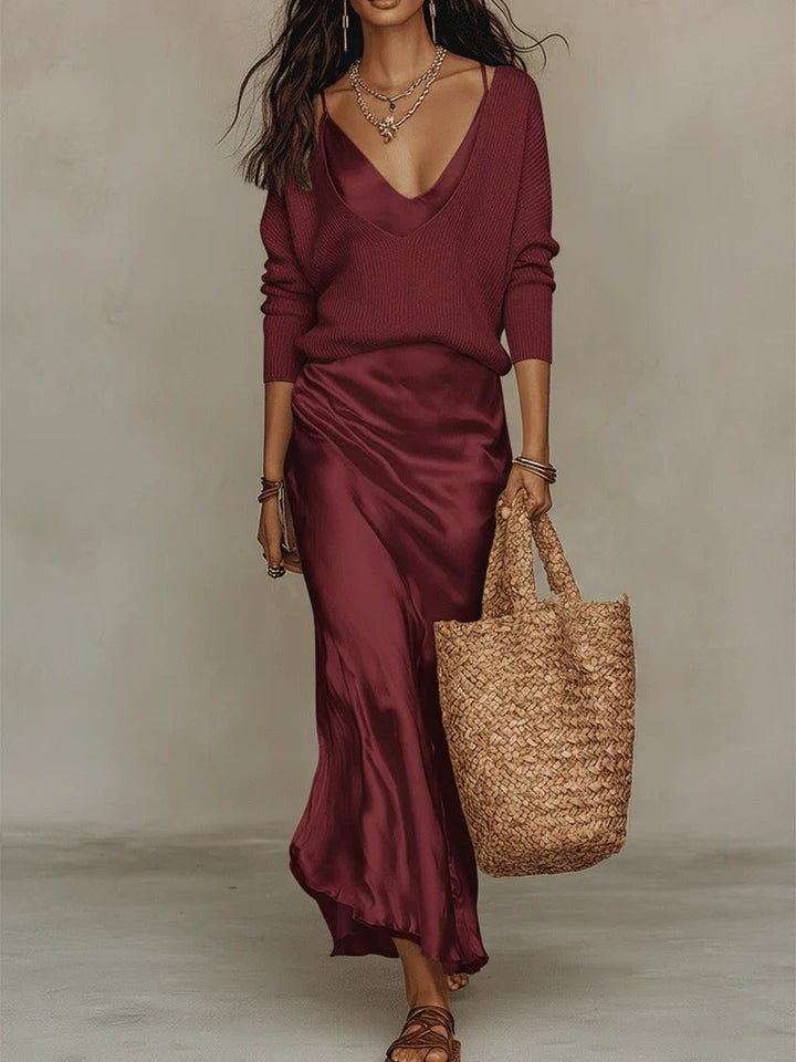 Sleek V-neck women's maxi slip dress with adjustable straps, offering an elegant long silhouette.