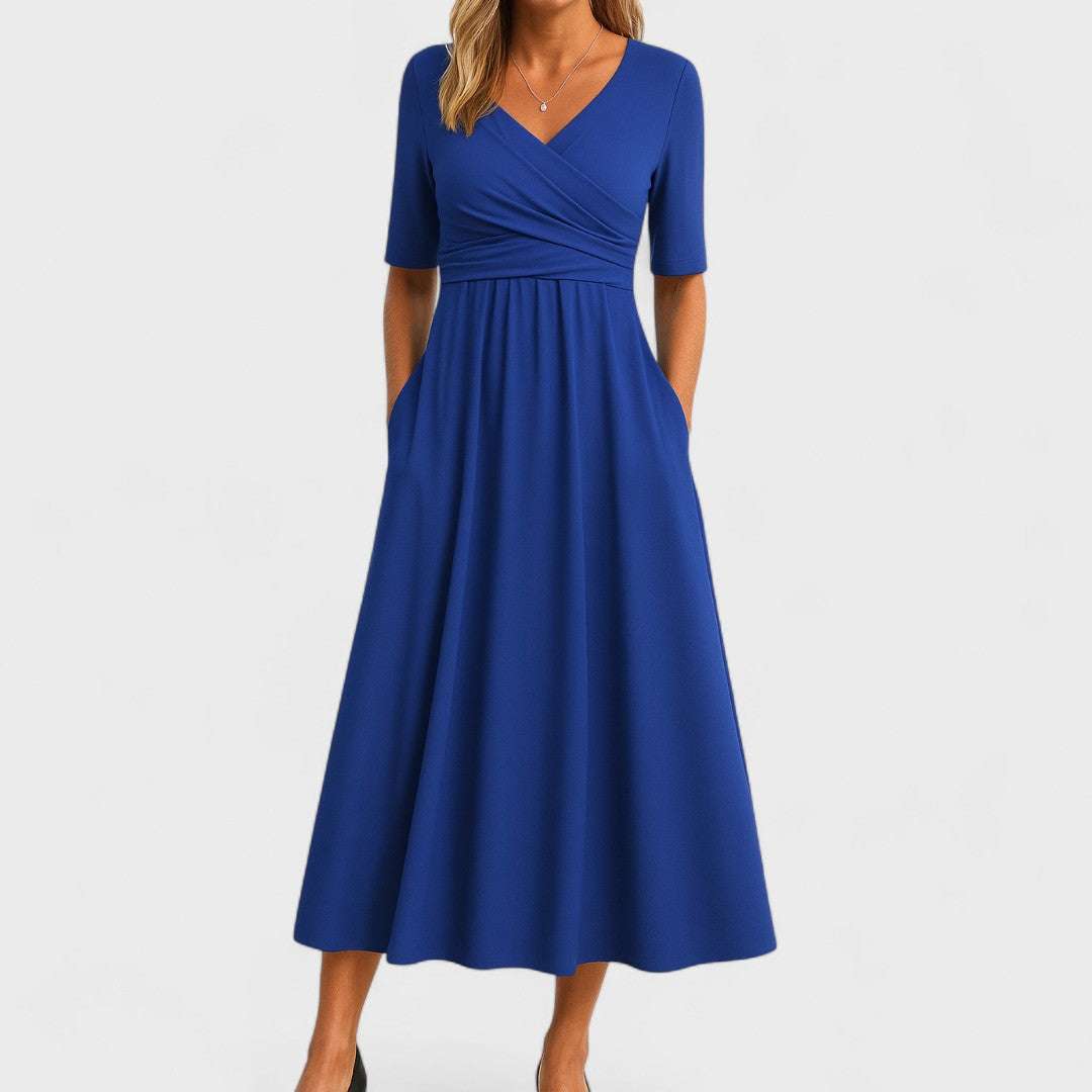 Versatile women's midi dress with a flattering V-neck and crossover waist. Comfortable and chic for office or casual.