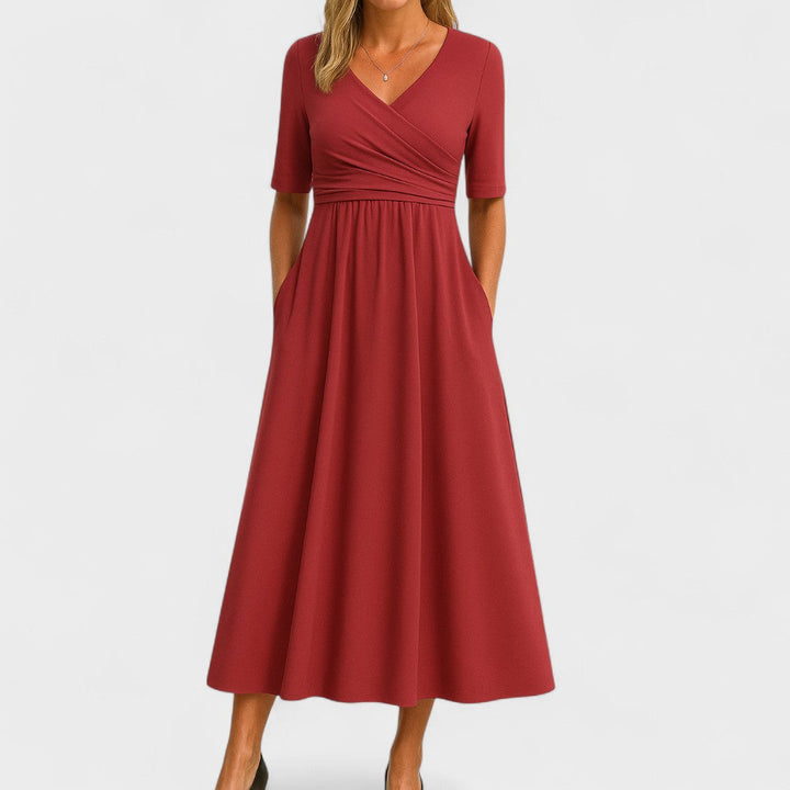 Comfortable women's midi dress with an elegant V-neckline & chic crossover waist detail. Perfect for day-to-night styling.
