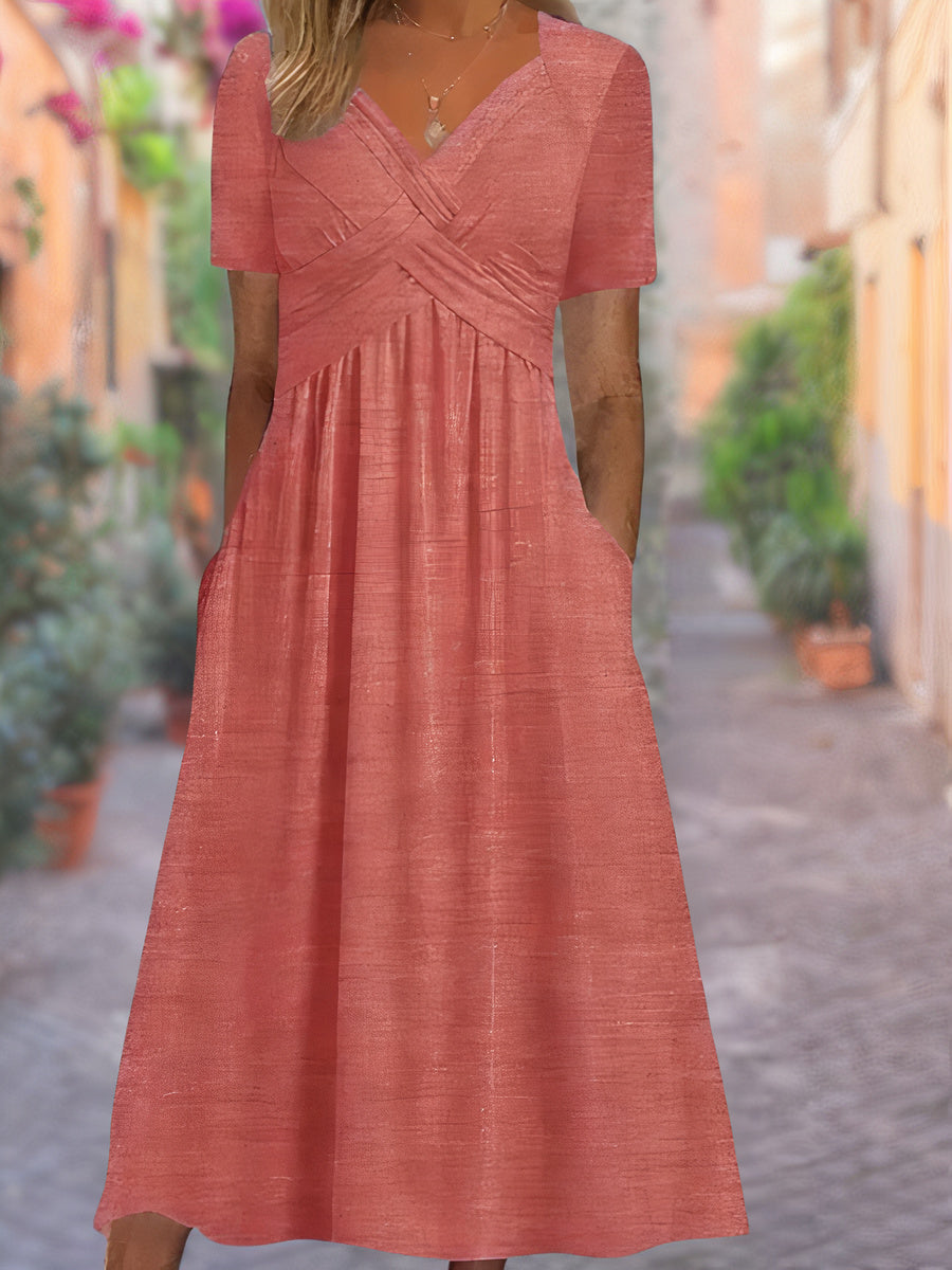 Stylish women's V-neck midi dress with unique crisscross bodice, ideal for elegant spring and summer fashion.