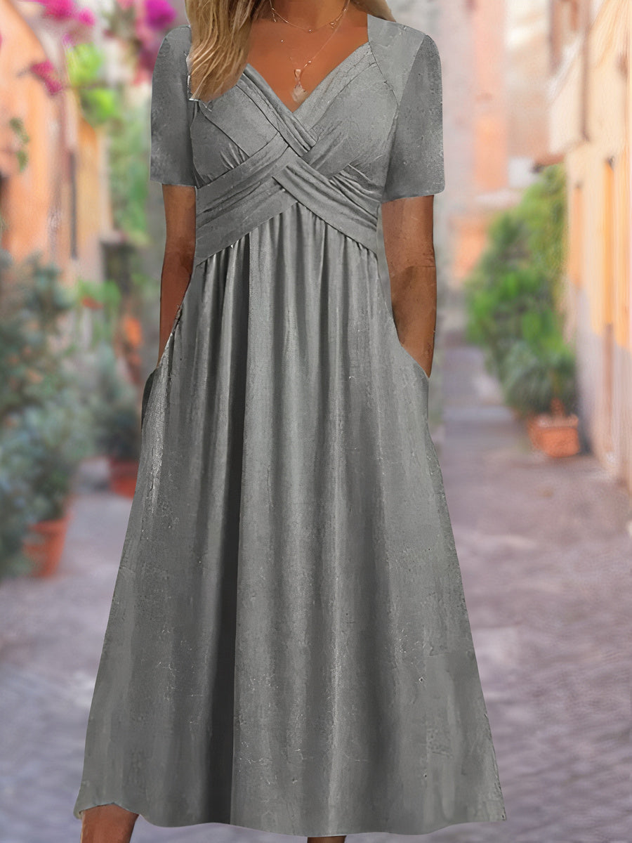 Chic women's V-neck midi dress with a distinctive crisscross bodice, a comfortable and elegant wardrobe essential.