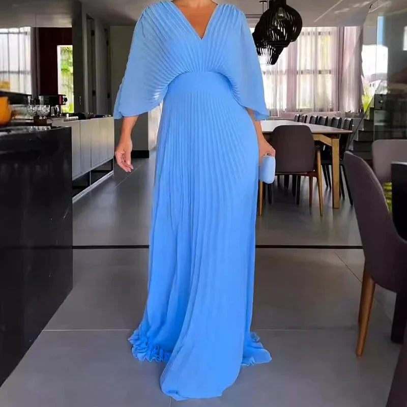 Stylish V-neck flowy kaftan maxi dress. Women's pleated design, great for elegant summer, vacation, and comfortable wear.