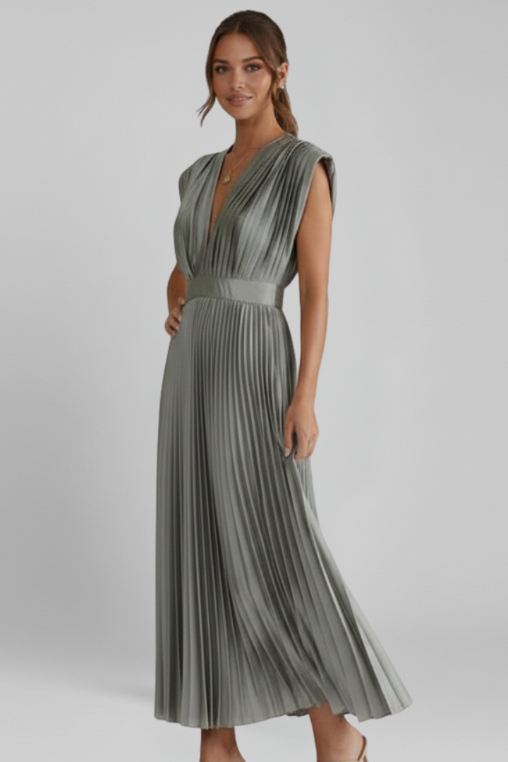 Women's V-neck pleated midi dress in a flowing, elegant design. Perfect long dress for summer events.