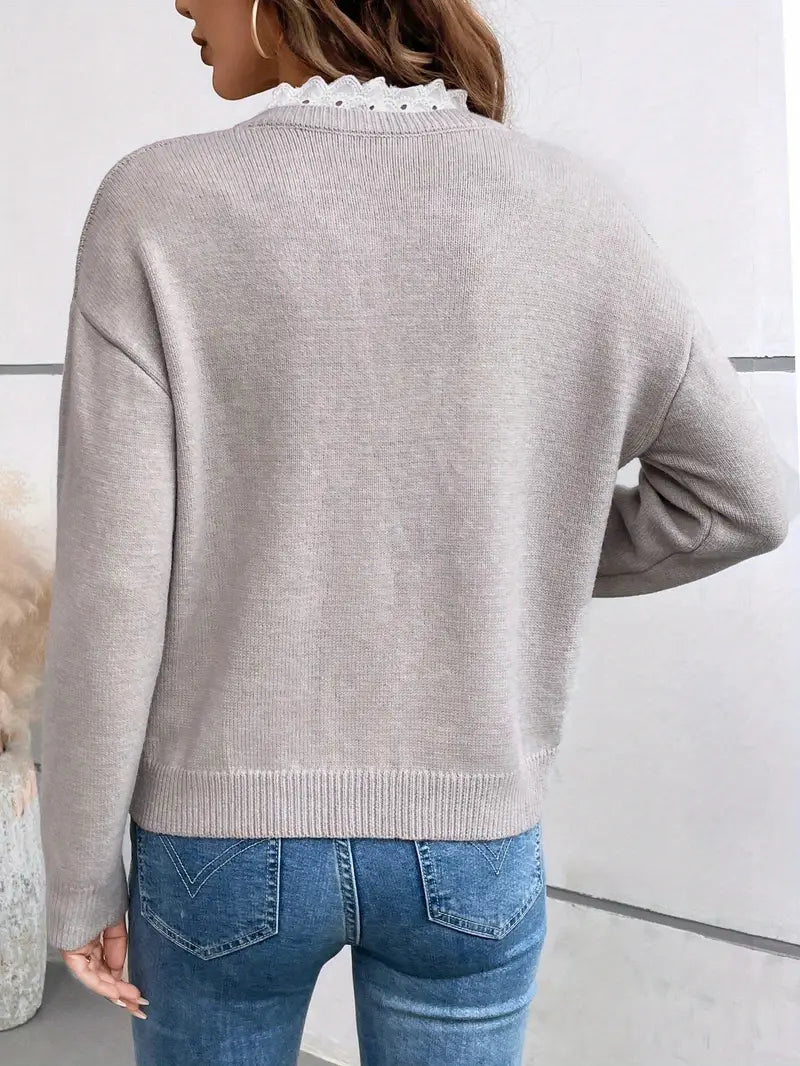 Chic women's lace-trim v-neck pullover sweater. Stylish, comfortable long sleeve top for a polished casual look.