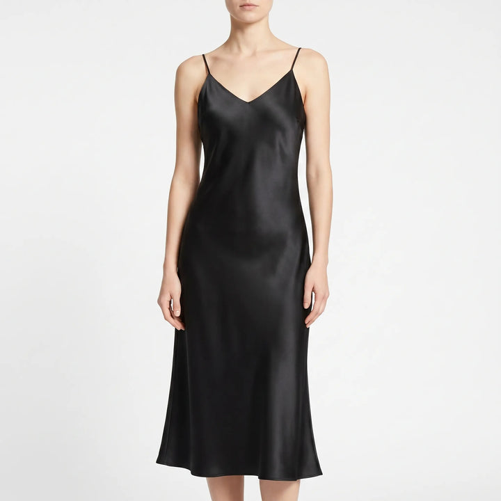 Stylish women's A-line slip midi dress with V-neck, ideal for formal occasions or summer wear.