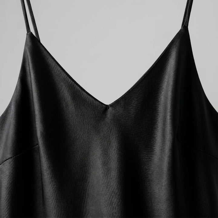 Sleeveless women's V-neck midi slip dress, designed for a sleek and elegant look at any event.