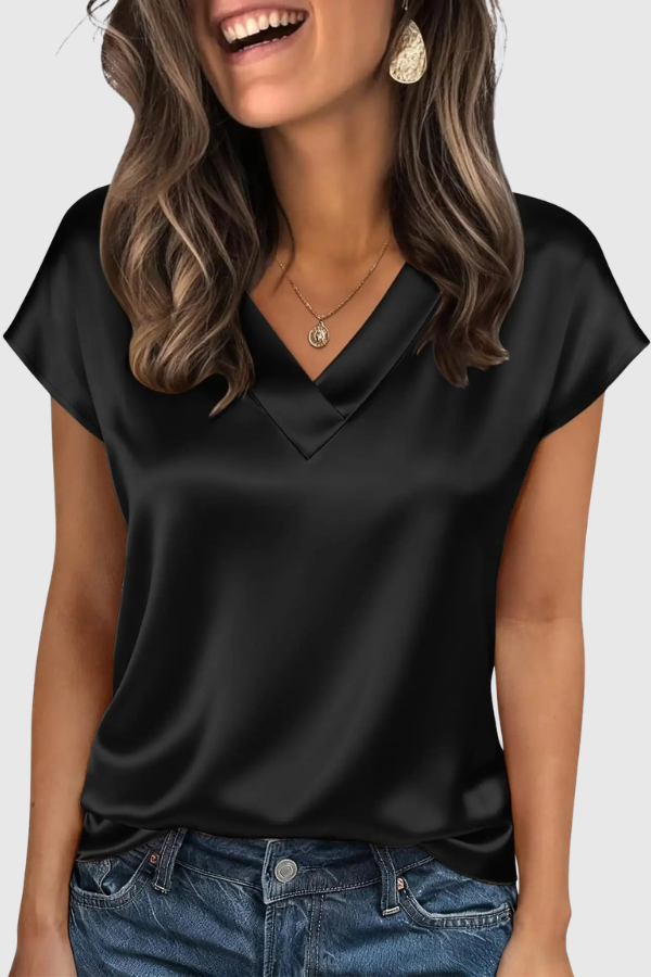 Chic women's V-neck summer top, versatile for vacation or everyday wear, comfy short sleeve fit.