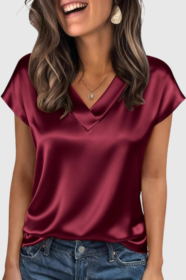 Casual women's short sleeve V-neck blouse, loose fit summer top, ideal for everyday fashion & comfort.