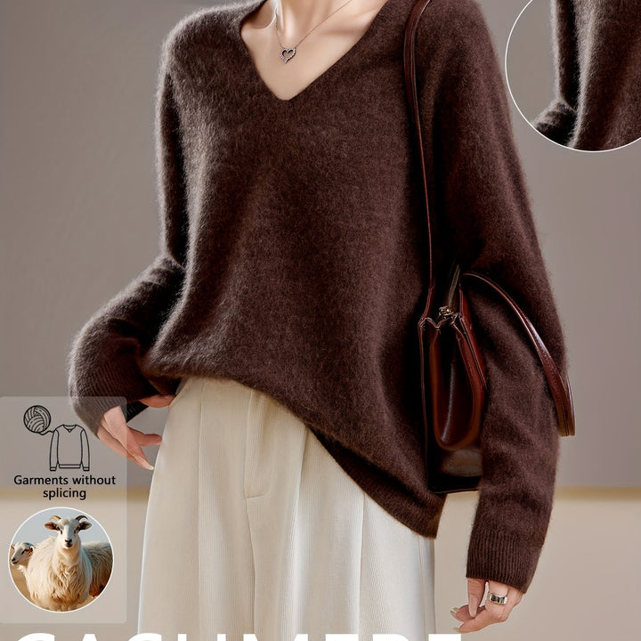 Comfortable women's V-neck sweater with an oversized, relaxed fit for cozy autumn style.