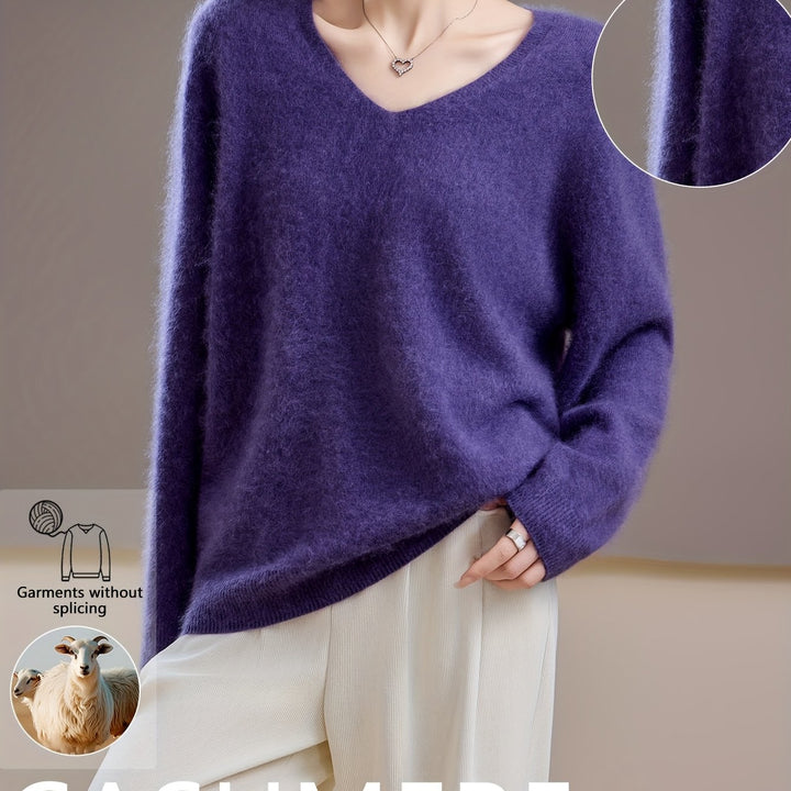 Sophisticated women's V-neck sweater, a cozy, relaxed fit top for elegant everyday wear.