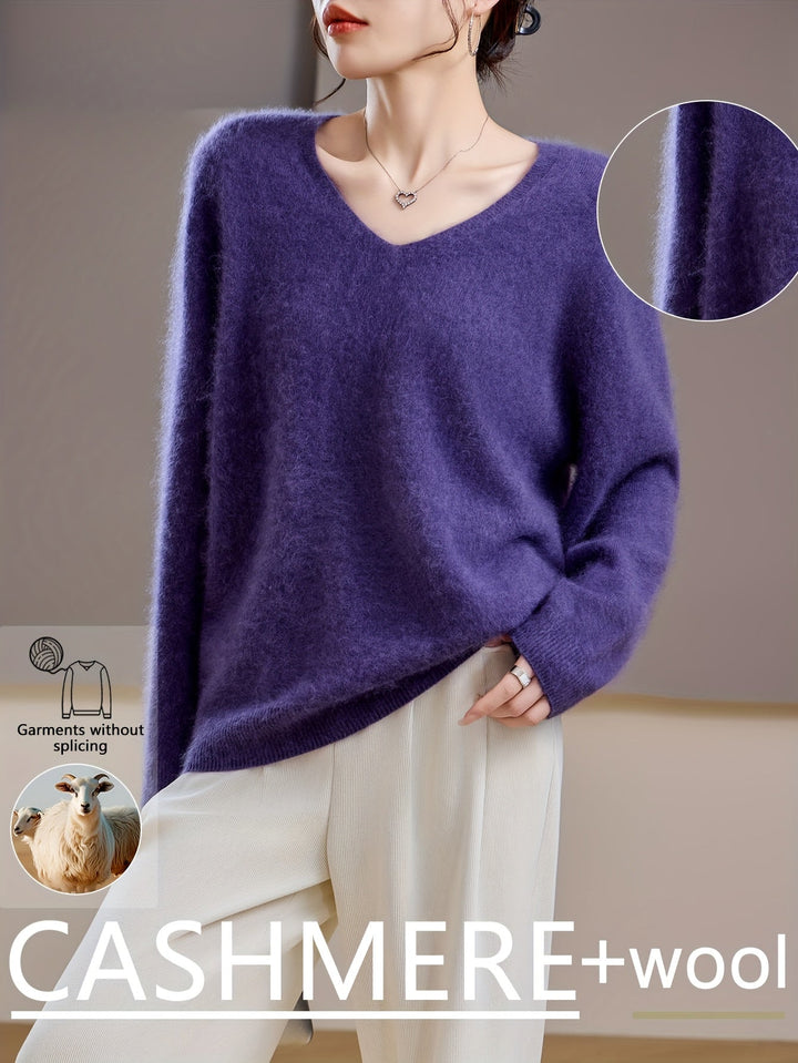 Relaxed fit V-neck sweater for women, a chic & comfortable long sleeve knitwear top.