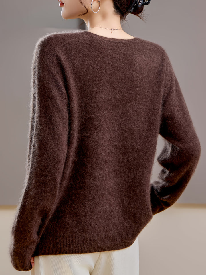Soft & cozy women's V-neck sweater, relaxed fit for ultimate comfort in winter fashion.