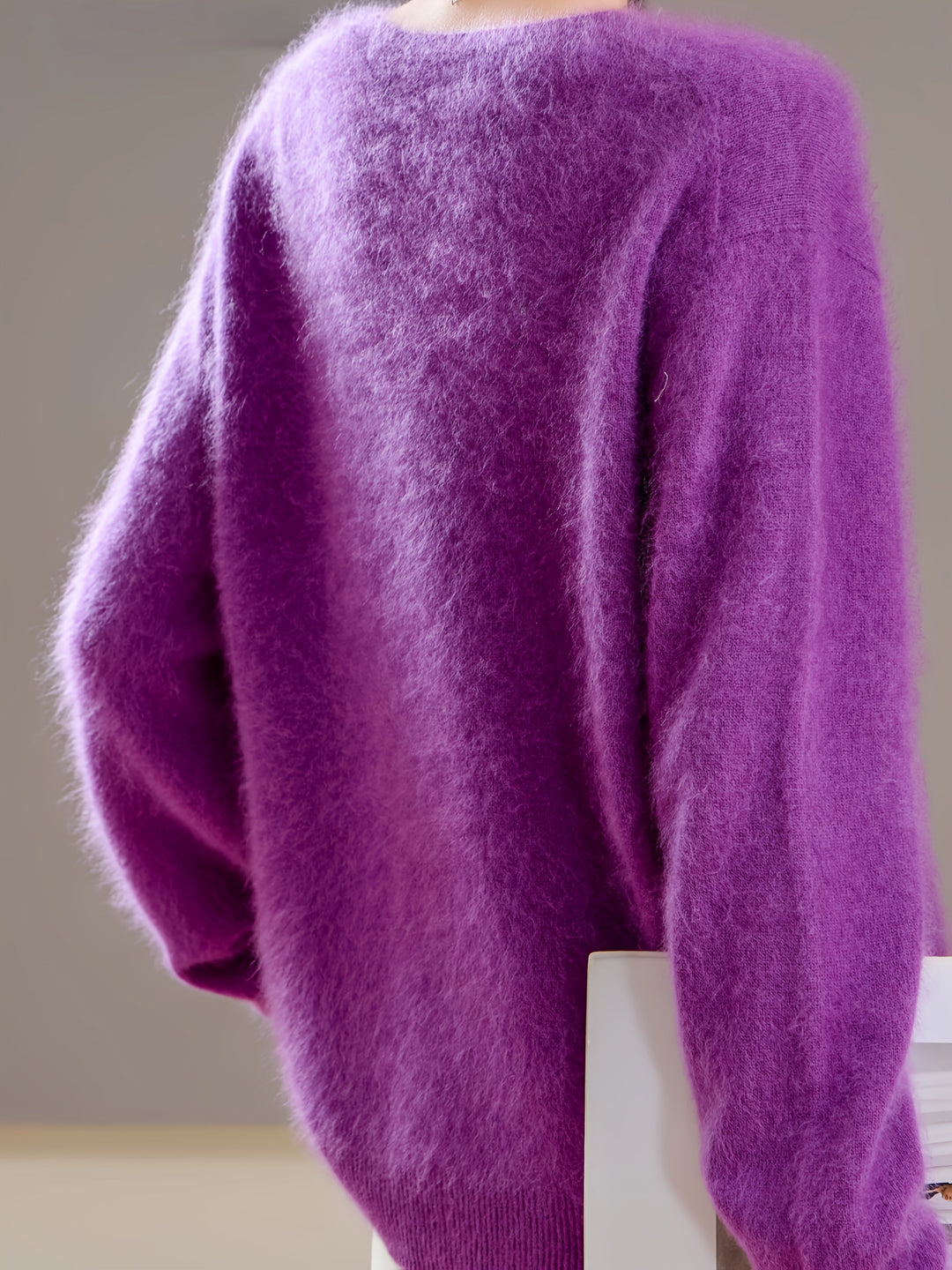 Chic women's V-neck oversized sweater, an elegant piece for modern autumn & winter fashion.