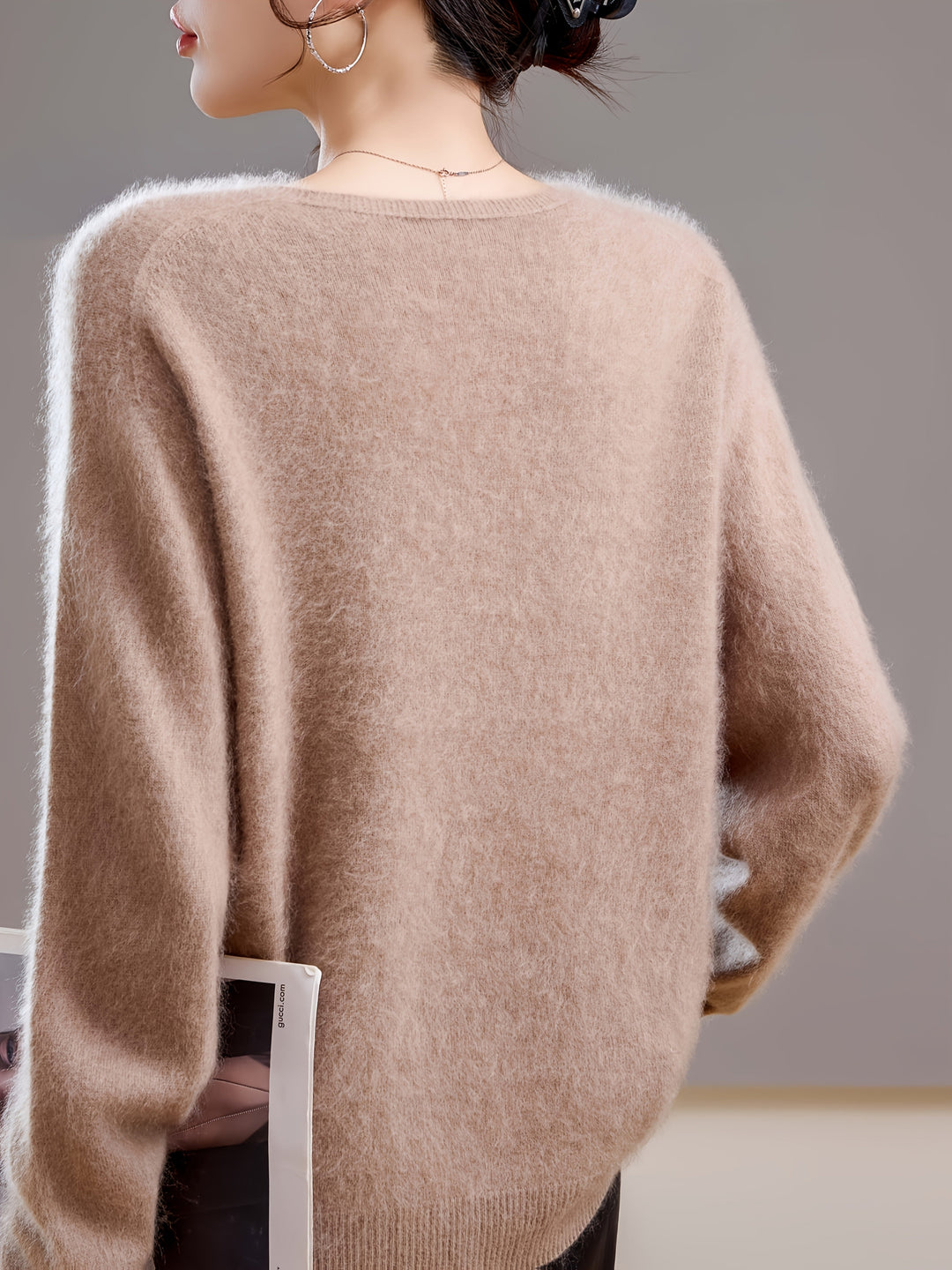 Warm & cozy women's V-neck sweater, perfect for winter layering and comfortable elegance.
