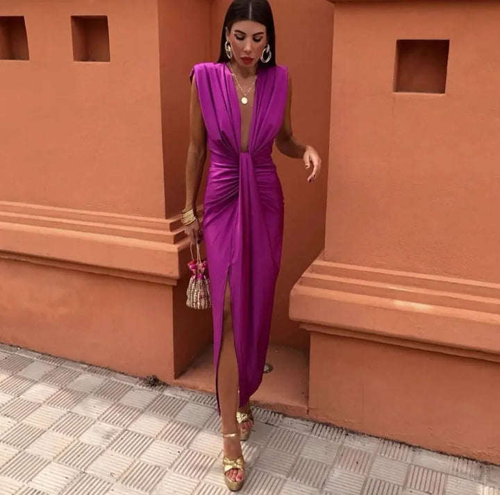 Chic long V-neck wedding guest dress with a stylish twist front, ideal for formal parties & special occasions.
