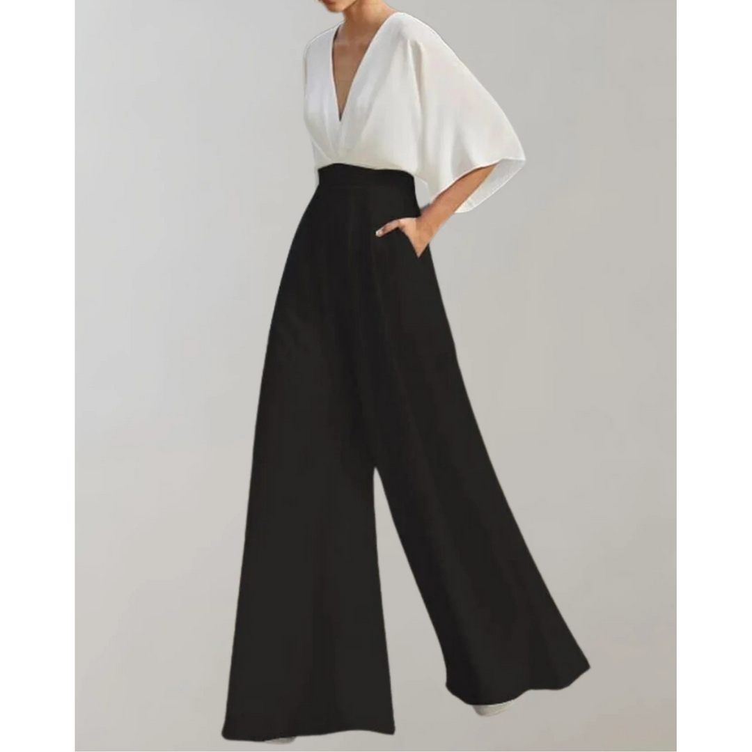 Women's sophisticated V-neck wide-leg jumpsuit, an elegant and modern flowy formal outfit.