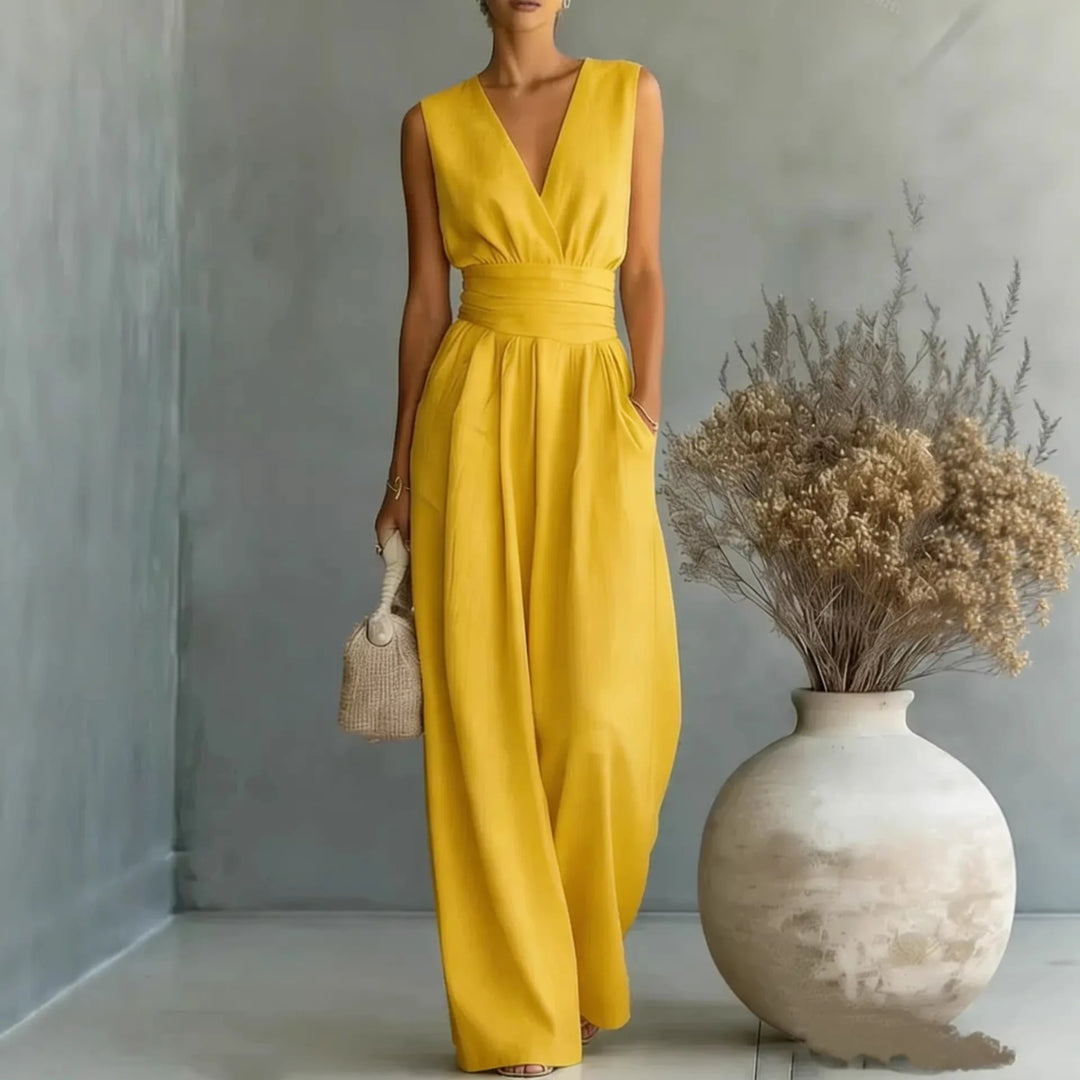 Sophisticated women's V-neck wide-leg sleeveless jumpsuit, a stylish and flowy one-piece party outfit.