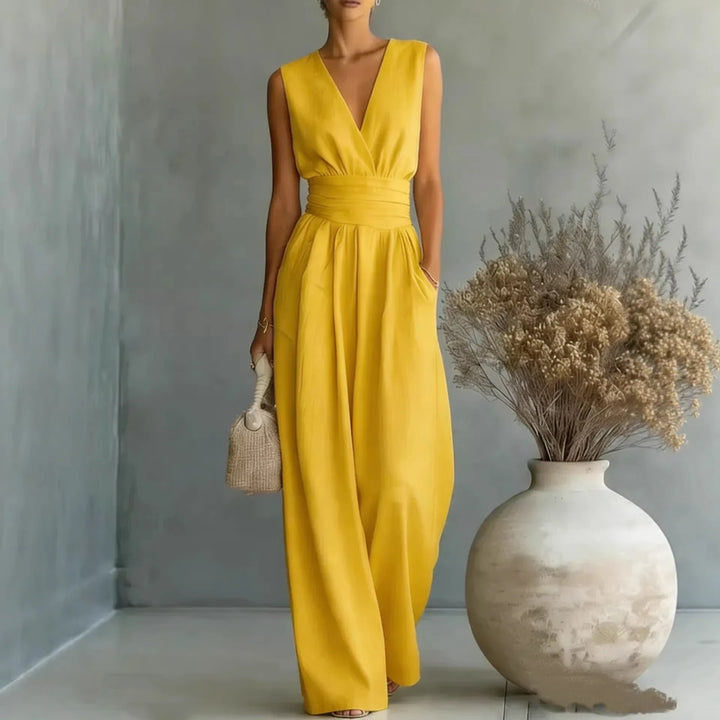 Sophisticated women's V-neck wide-leg sleeveless jumpsuit, a stylish and flowy one-piece party outfit.