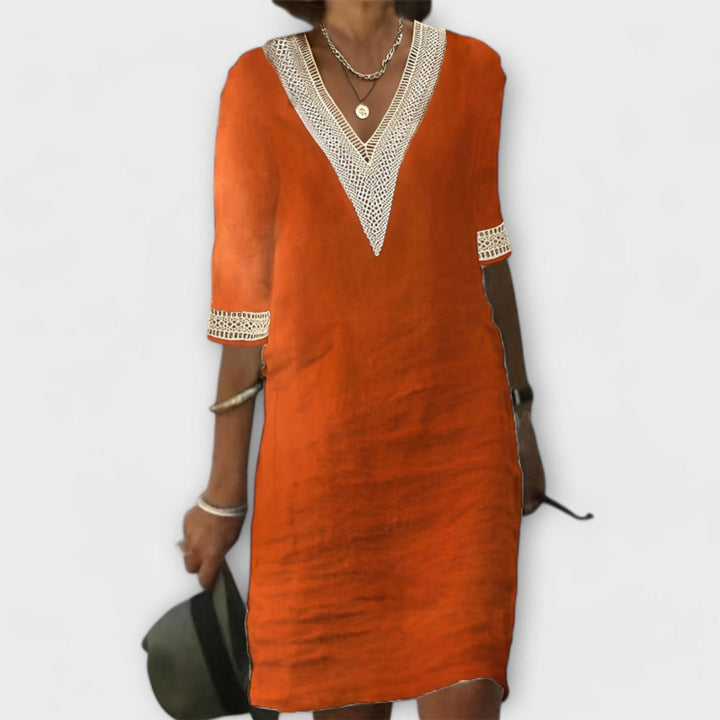 Bohemian flowy crochet dress for women, featuring a delicate openwork pattern, ideal for casual summer days & resort.