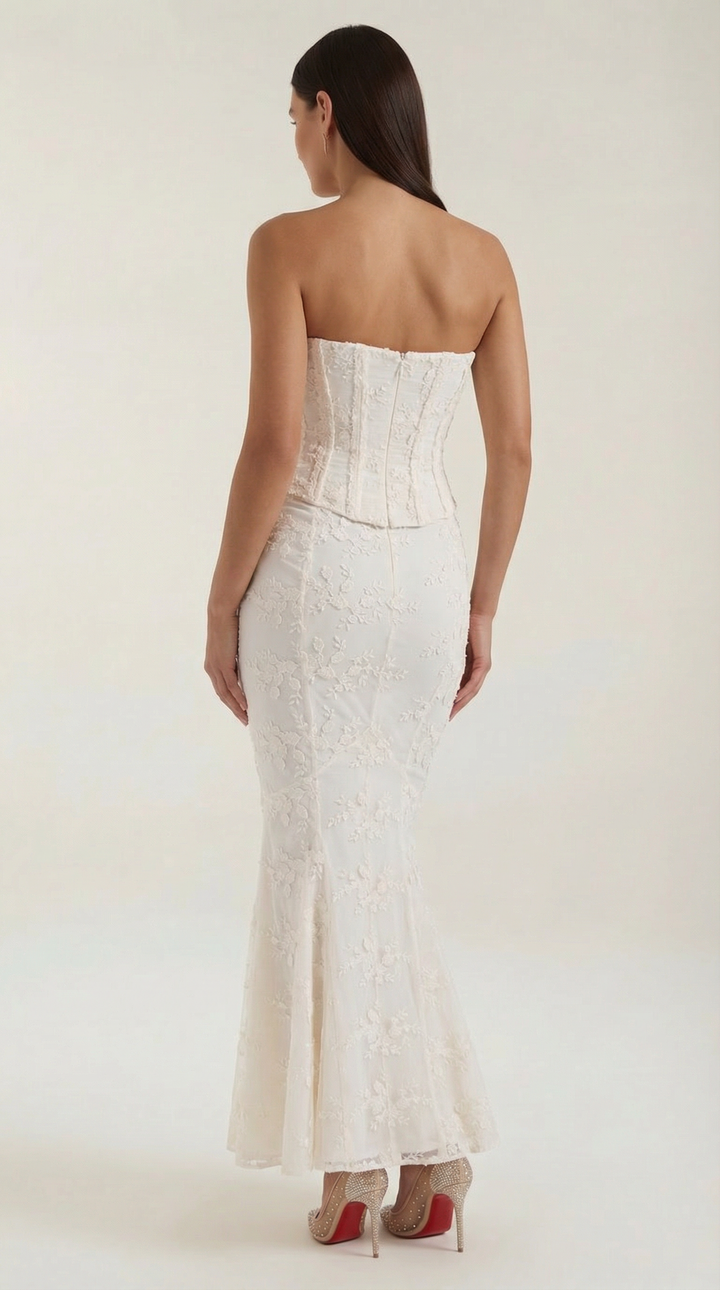 Stunning white strapless corset gown, a women's elegant maxi dress ideal for formal parties or special occasions.