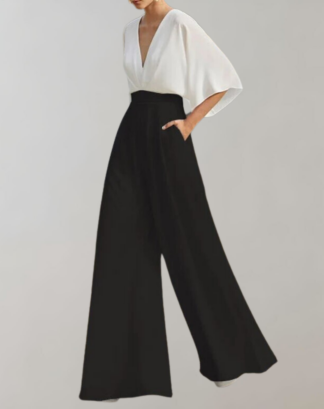 Modern women's wide leg jumpsuit, elegant and versatile evening wear for formal gatherings.