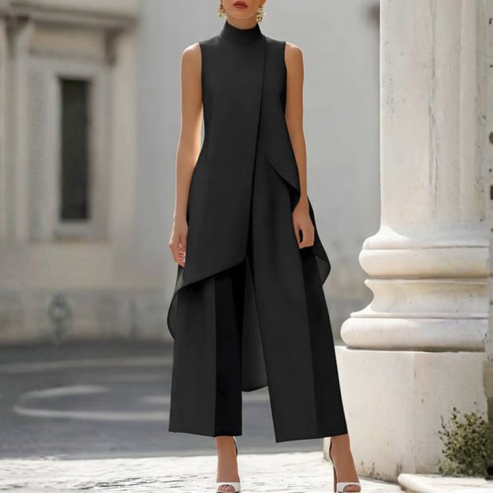 Sleeveless women's wide-leg jumpsuit featuring a sophisticated high neck and chic drop waist design.