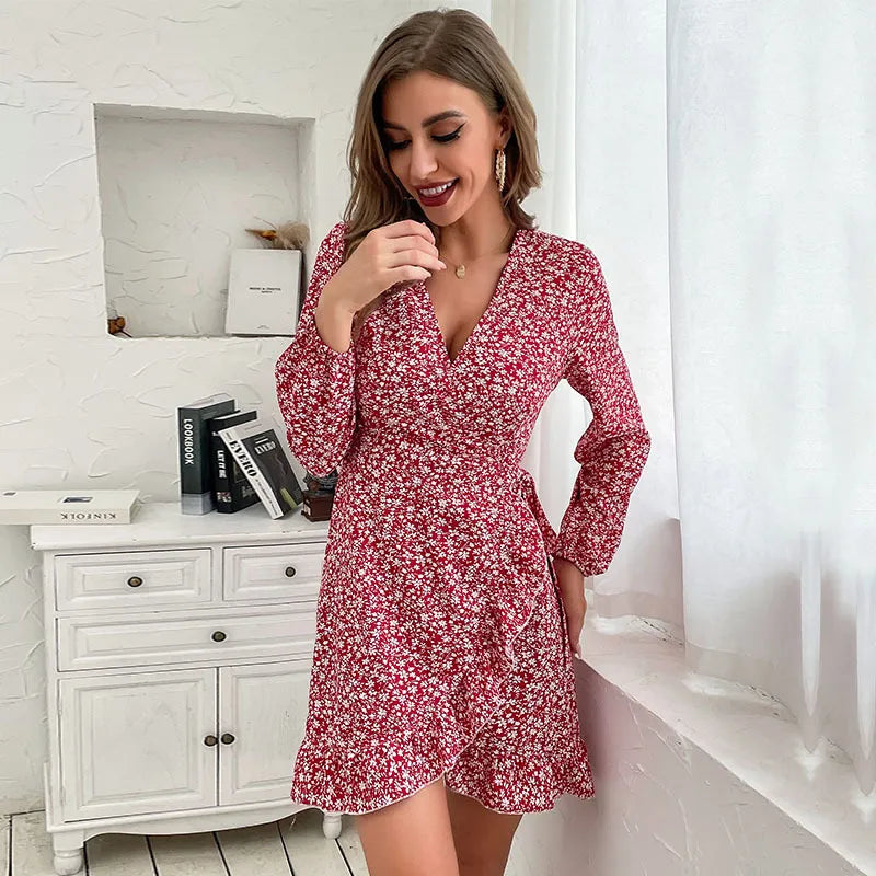Chic women's fall cocktail mini wrap dress, featuring a V-neck, long sleeves, and a flattering ruffle hem.
