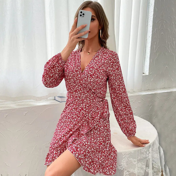 Wine red floral print women's elegant V-neck wrap dress with a ruffle hem and long sleeves for fall fashion.