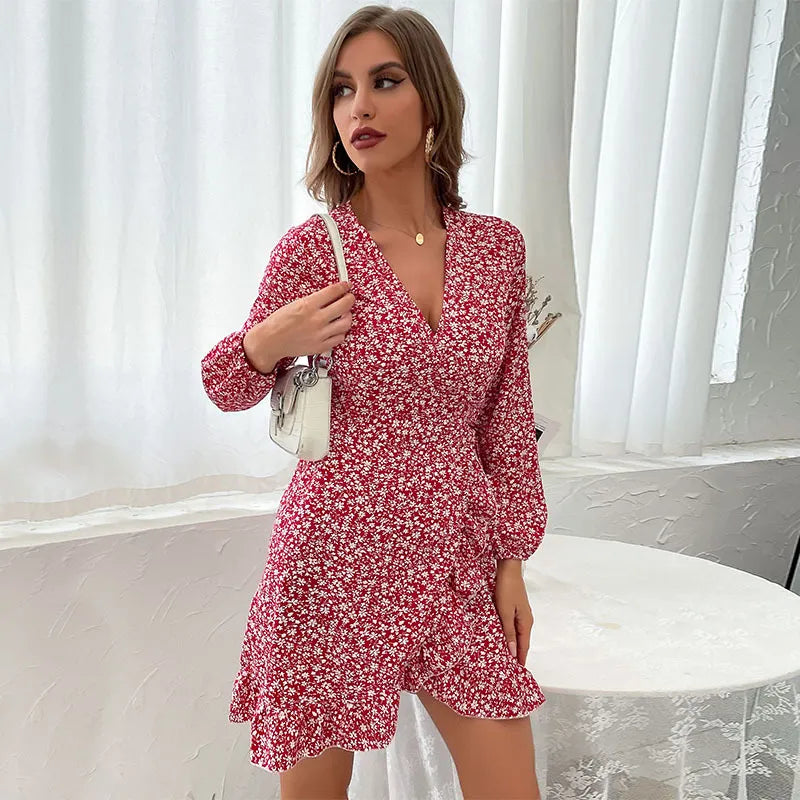 Women's elegant V-neck wrap mini dress in autumn style, with ruffles, long sleeves, and a flattering tie waist.