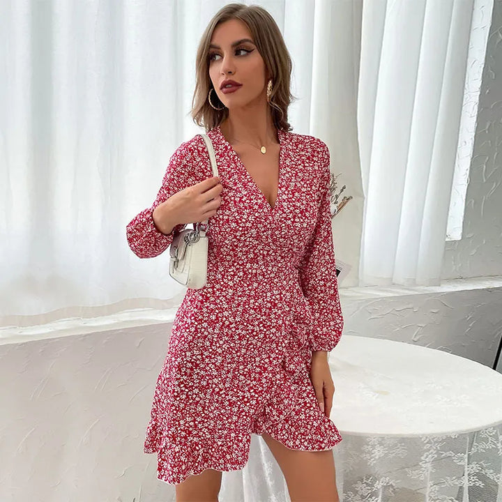 Women's elegant V-neck wrap mini dress in autumn style, with ruffles, long sleeves, and a flattering tie waist.