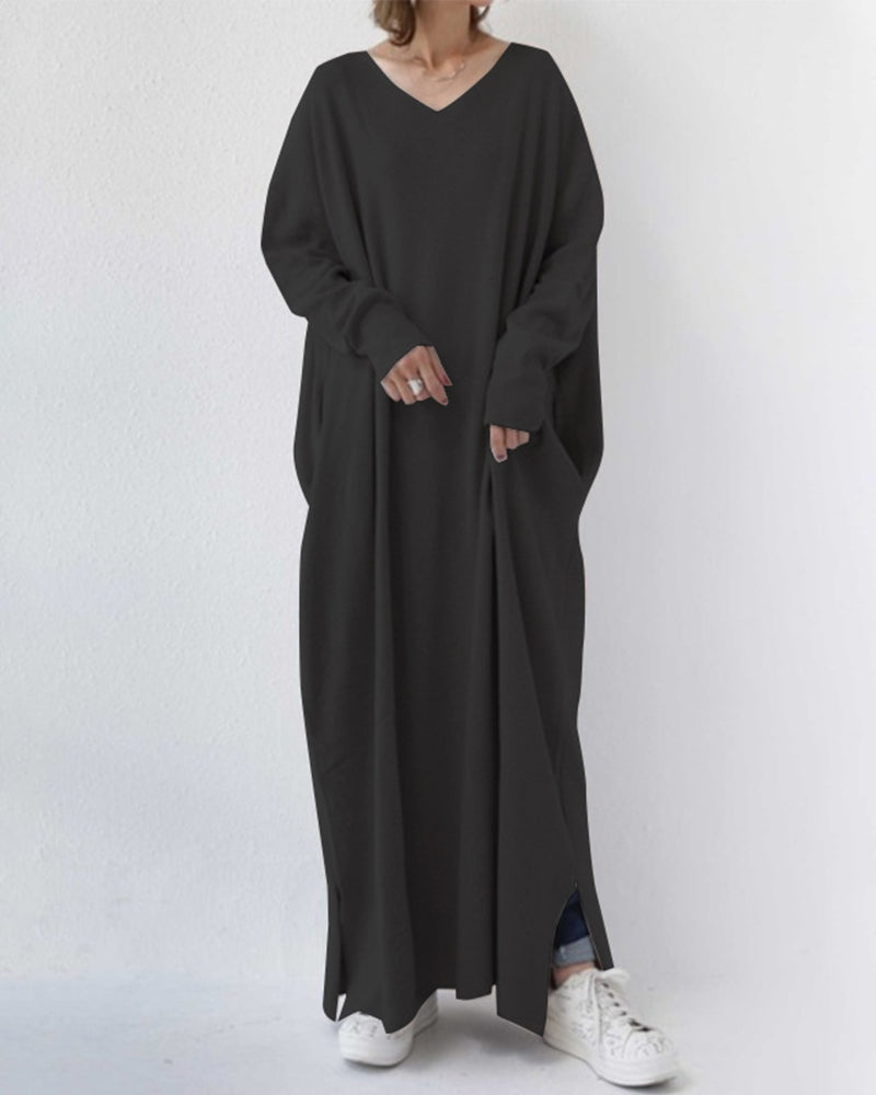 Grey women's long sleeve maxi dress, flowing and elegant, ideal for winter casual or evening wear.