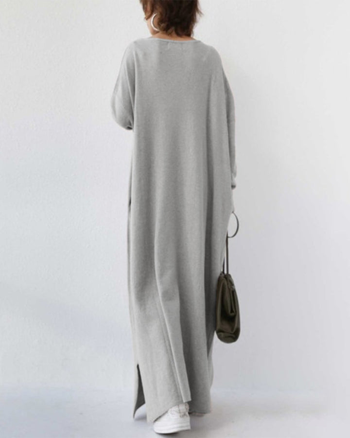 Flowy women's long sleeve winter maxi dress, offering elegant comfort for cold weather fashion.