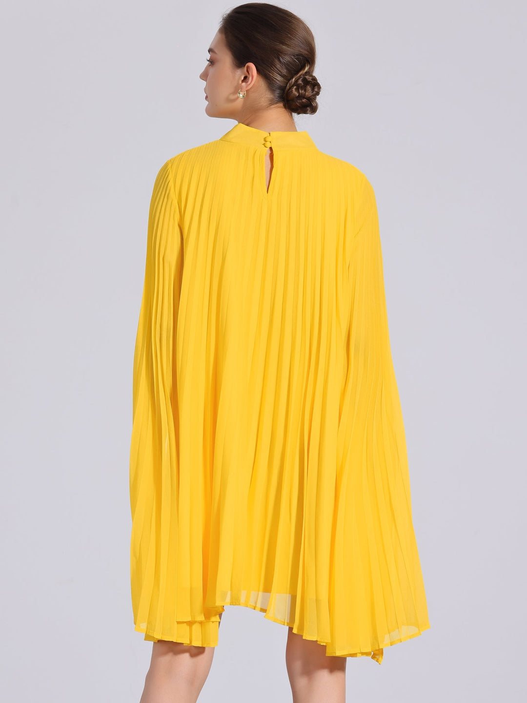 Stylish yellow pleated swing dress for women, featuring unique cape sleeves & a flattering flowy silhouette.