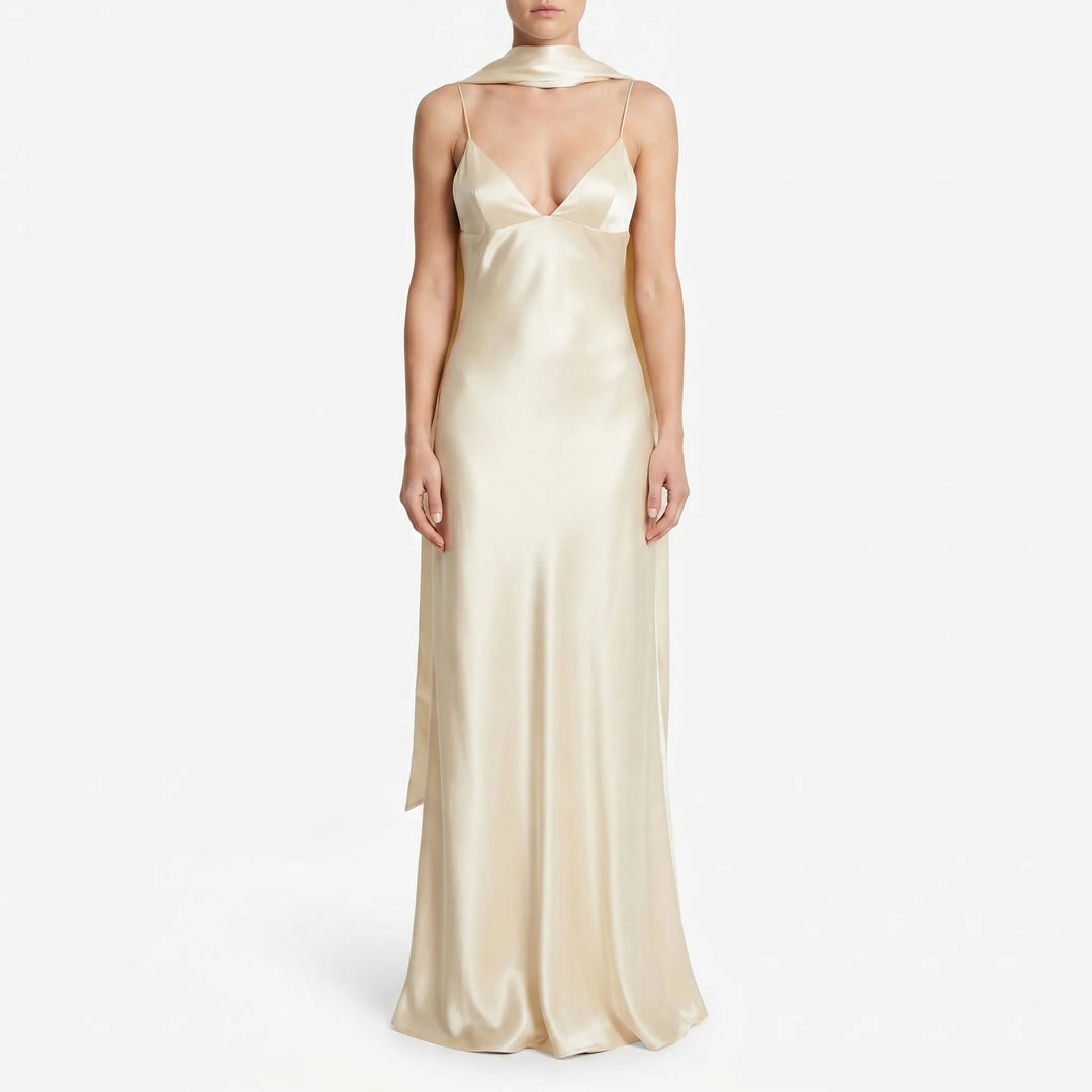 Sleeveless elegant yellow slip dress for women, featuring a flattering v-neck & open back, ideal for special occasions.