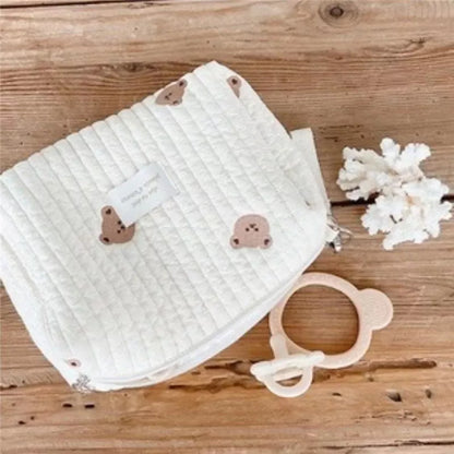 Newborn essentials: embroidered cotton stroller organizer and diaper caddy bag, practical storage
