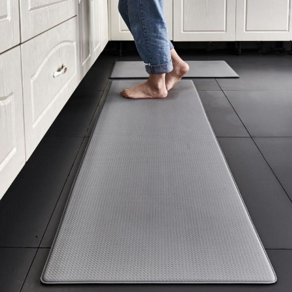 Comfortable anti-fatigue mat for long standing in the kitchen, reducing pressure and enhancing support.