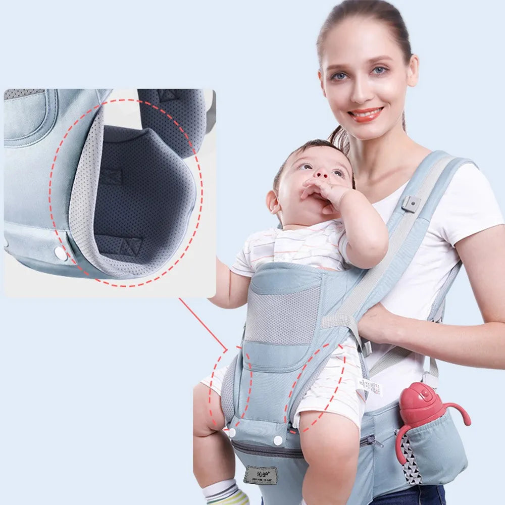 Outdoor scene: parent using ergonomic baby carrier with hip seat, enjoying a walk with infant.